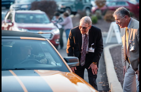 Dr. Hartle greets veterans at the veterans drive through 