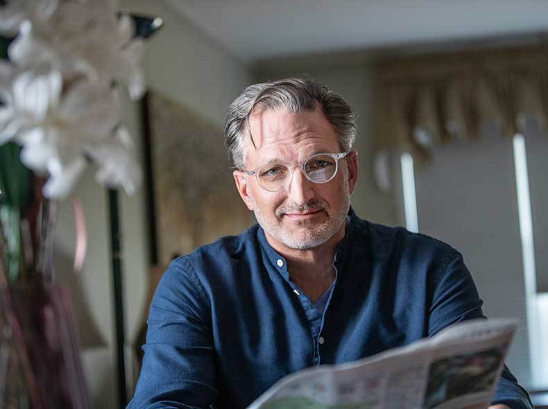 man reading a news paper