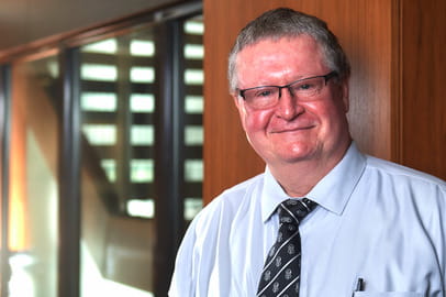 John L. Szarek,