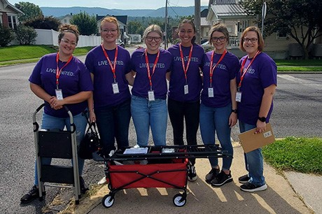 an image of students at the Day of Caring event