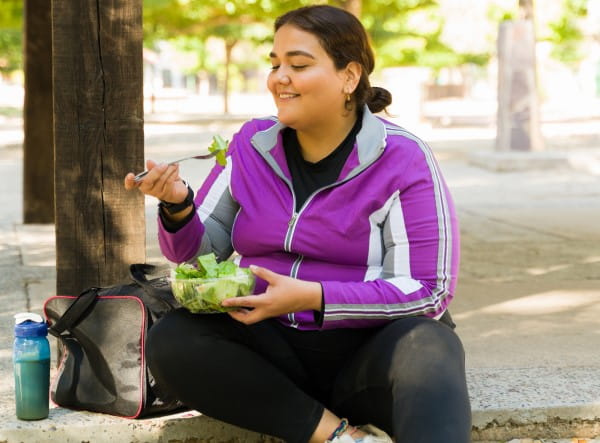 Girl eating a salad