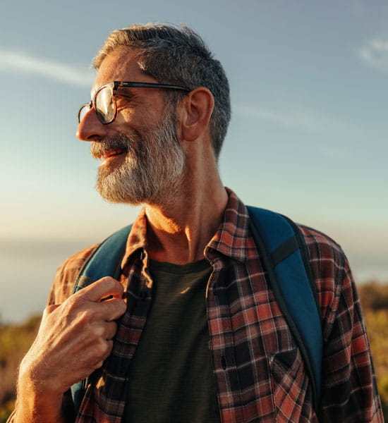 man with backpack outdoors