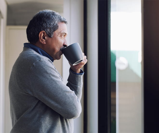 Happy man drinking tea