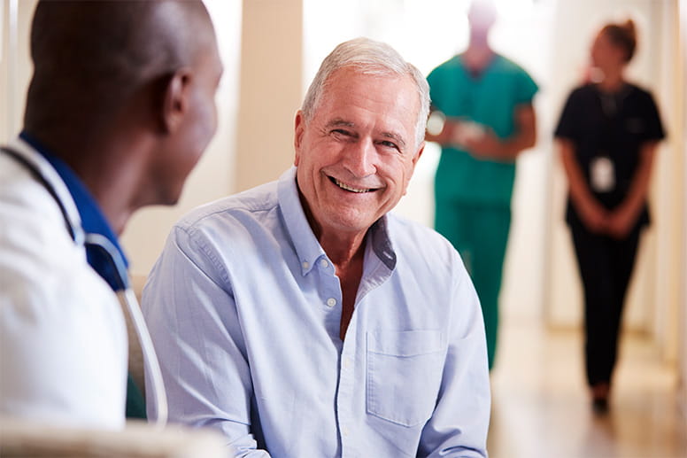 Doctor with patient in hospital