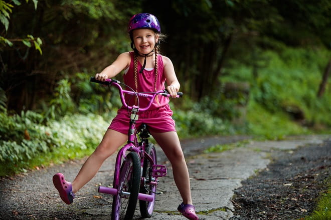 Young girl riding a bike