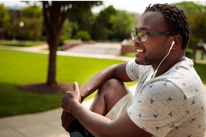 A man listening to headphones
