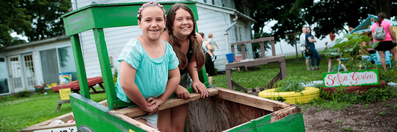 Children playing at farmer's market