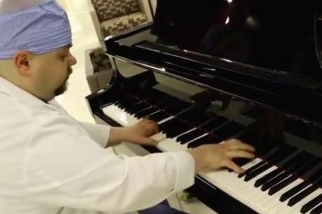 Dr. Ricky Clay plays the piano at Geisinger Community Medical Center