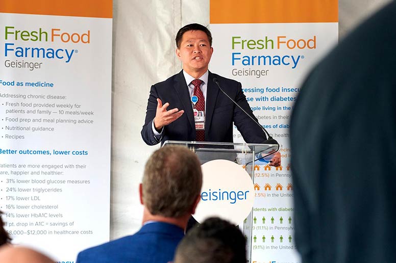 Dr. Jaewon Ryu addresses the crowd at the Scranton Fresh Food Farmacy opening.