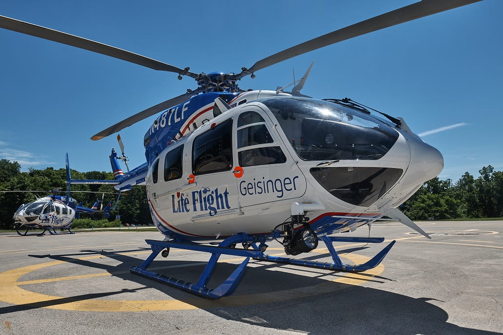 A Geisinger Life Flight helicopter sits on the helipad.
