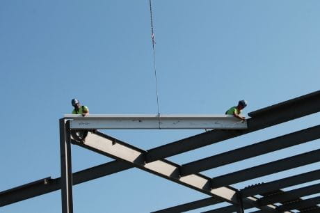 Construction workers set the final steel beam into place at Geisinger Medical Clinic Lock Haven.