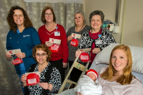 Geisinger Holy Spirit staffers show off their work with the Little Hats, Big Hearts campaign