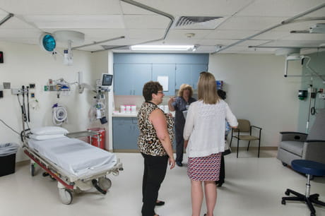 Women speaking inside a new GSWB emergency room.