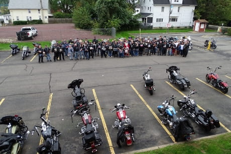 Motorcycles and group shot following donations at GSWB.