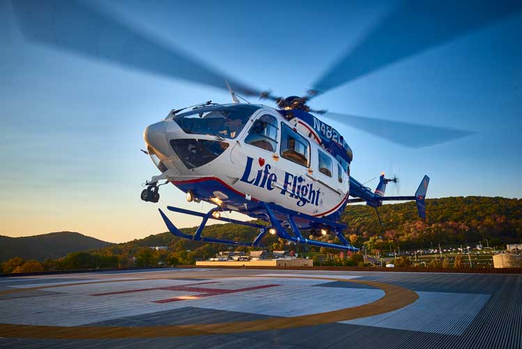 A Life Flight helicopter lands on the Geisinger Medical Center landing pad.