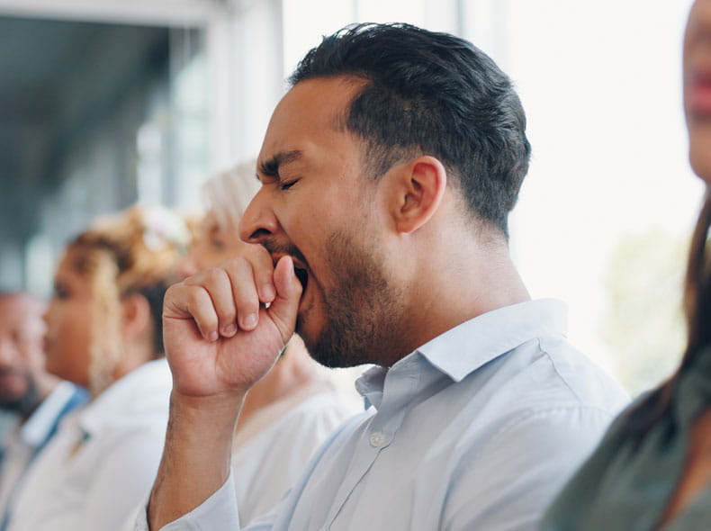 A man yawning due to low testosterone