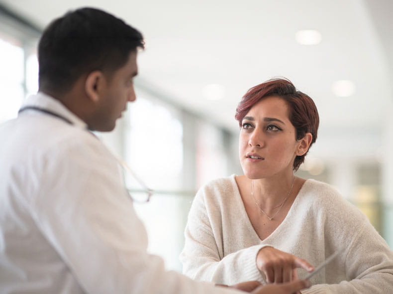 A Doctor talking to a family member