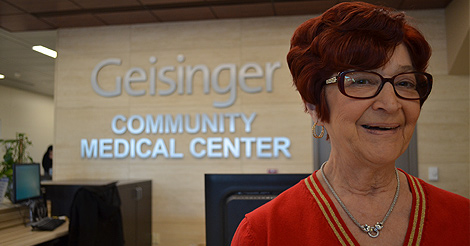 Woman in red smiling - Geisinger Community Medical Center