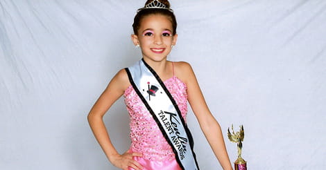 8-year-old dancer and gymnast is back on the stage after a major arm surgery