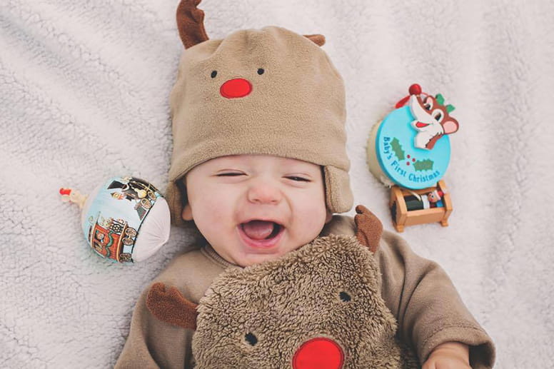 Baby in reindeer outfit 