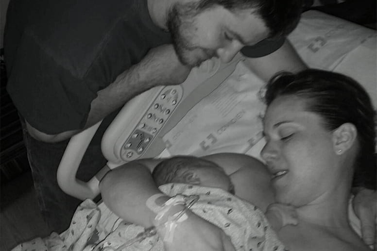 Tiffany and Alex Boozel with their newborn son, Konner.