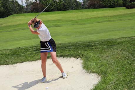 golfing woman