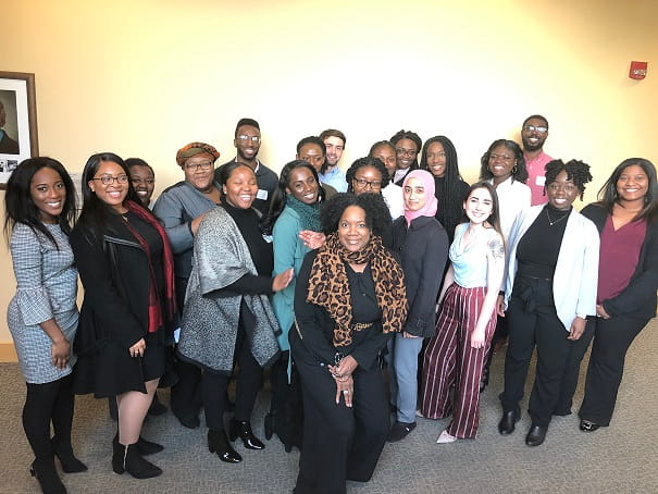 Vicki T. Sapp, PhD, director of student engagement, diversity and inclusion at Geisinger Commonwealth School of Medicine and a large group of medical students who attended a Racism in Medicine conference at Drexel University's College of Medicine.