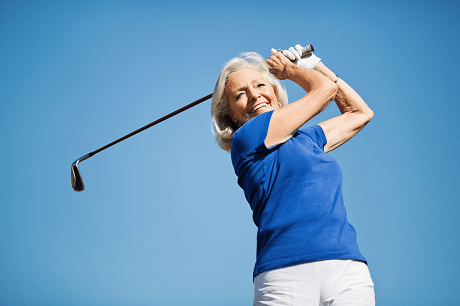 Woman playing golf