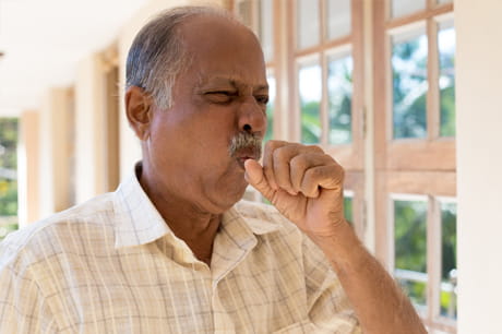 Man coughing