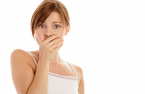 Woman hand over mouth 