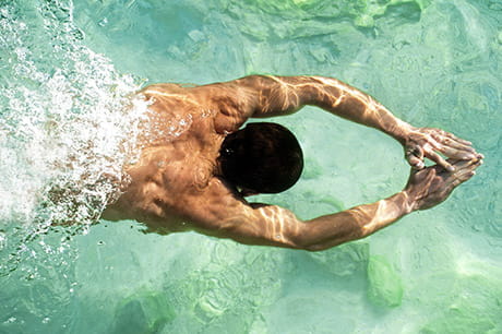 Man diving pool