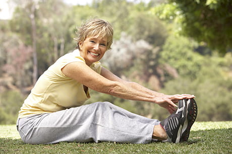 Wellness woman stretching prehab