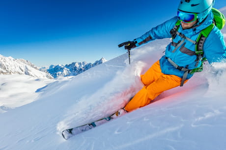 Man skiing downhill