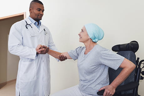 A doctor talking with a cancer patient