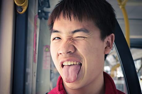 Man with tongue sticking out