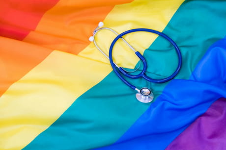Pride flag with stethoscope on it.