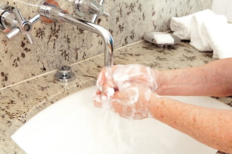 Person washing their hands