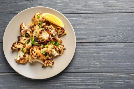 Grilled cauliflower steaks with beans and walnut pesto