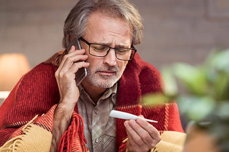 Man suspects he might have coronavirus-checking his temperature