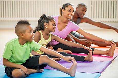 Family exercising together during quarantine period