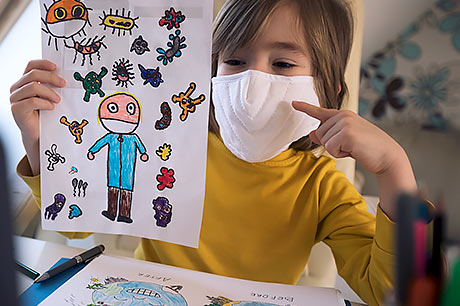 Young student learning about COVID-19