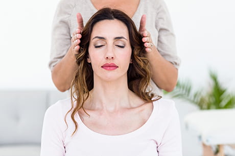 A woman receiving integrative medicine