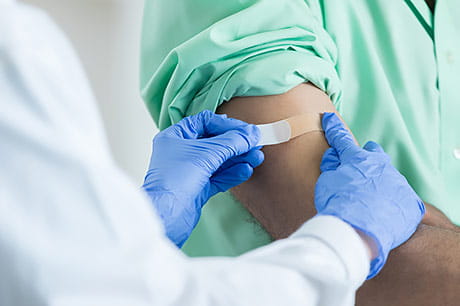 Patient receiving a flu shot.