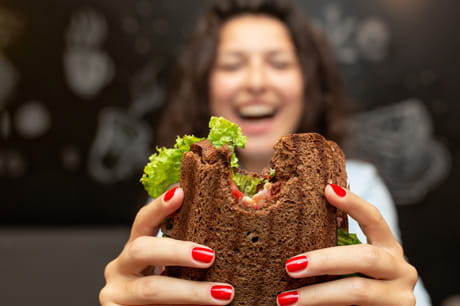 Woman eating a sandwich