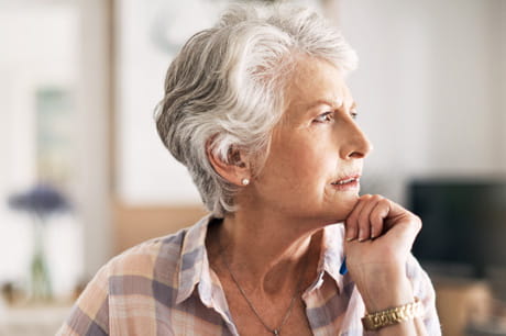 older woman looking off into the distance