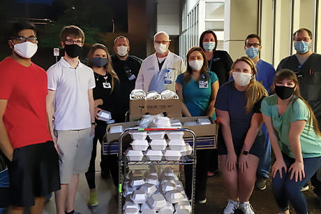 Geisinger Commonwealth School of Medicine students prepare to donate meals to the community.