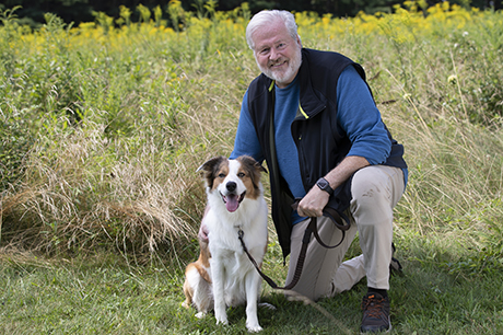 Gentleman walking dog