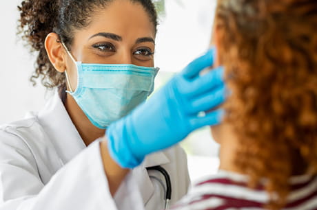 Doctor looking at a patient