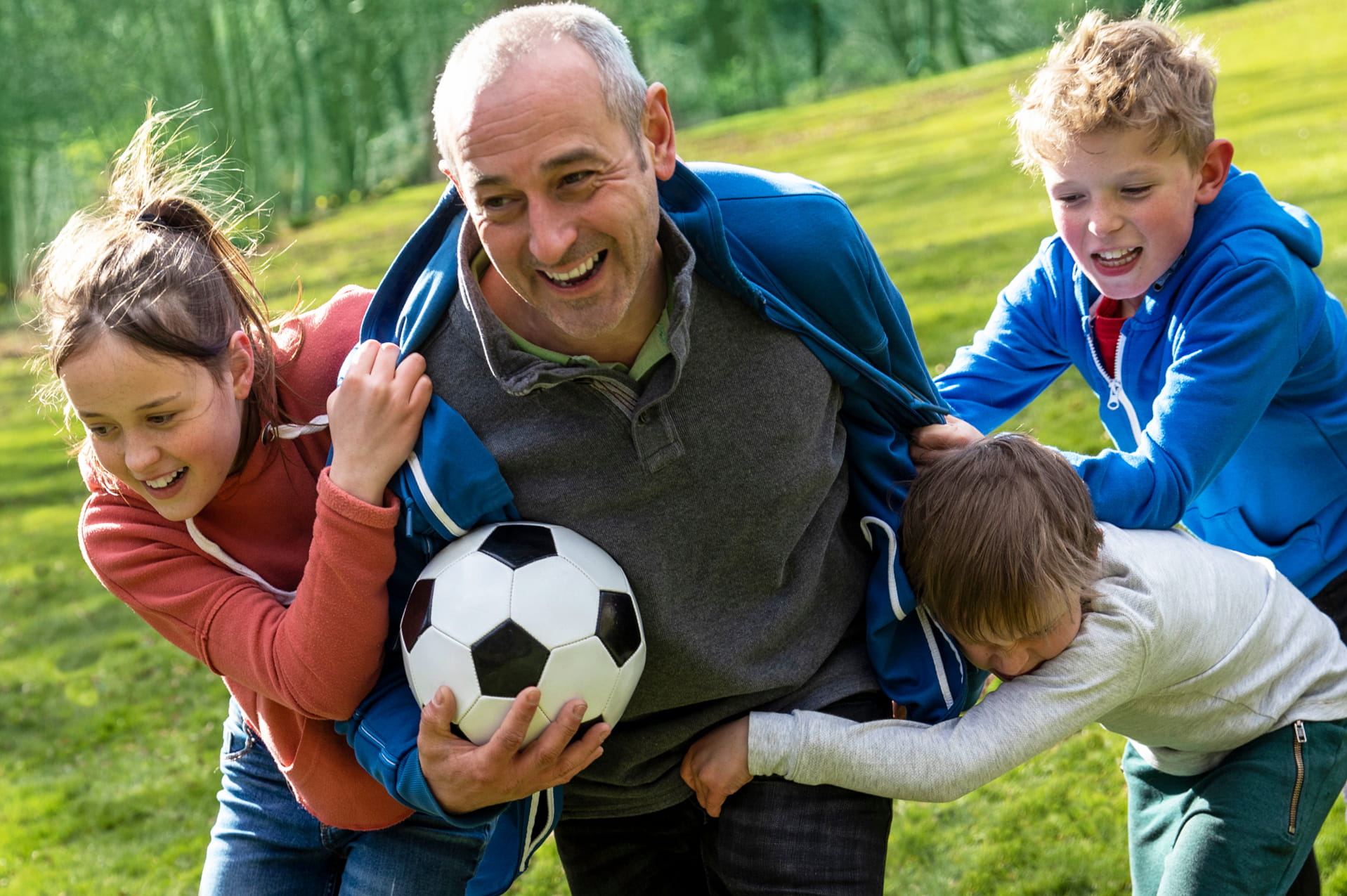 Man playing sports with kids