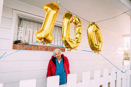 an image of a woman celebrating her 100th birthday
